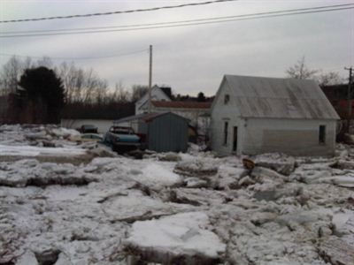 Homes surrounded by ice-jams