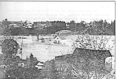 Maisons et pont inondés