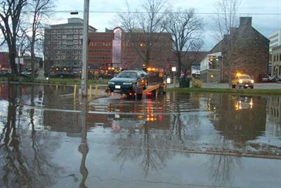 Car being towed near Officer's Square