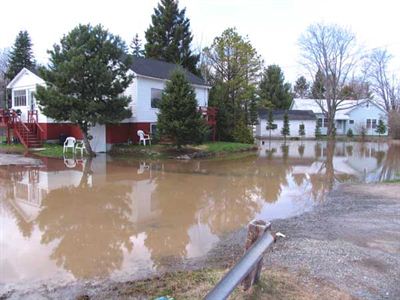 Red and white house inundated