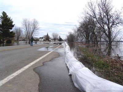 Roadway protected by sandbags