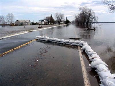 Roadway protected by sandbags