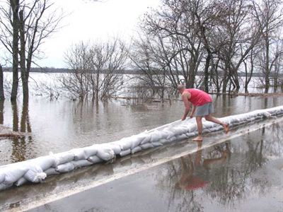 Roadway protected by sandbags