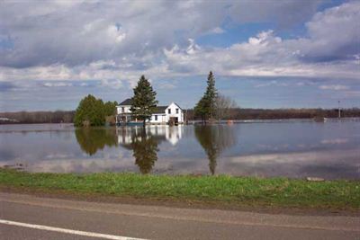 White house surrounded by water