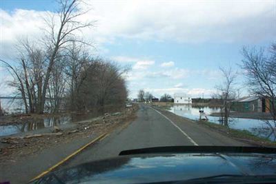 Debris shown on left side of road