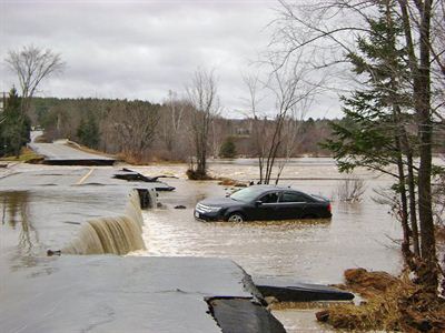 A car off a road at Burtts Corner.